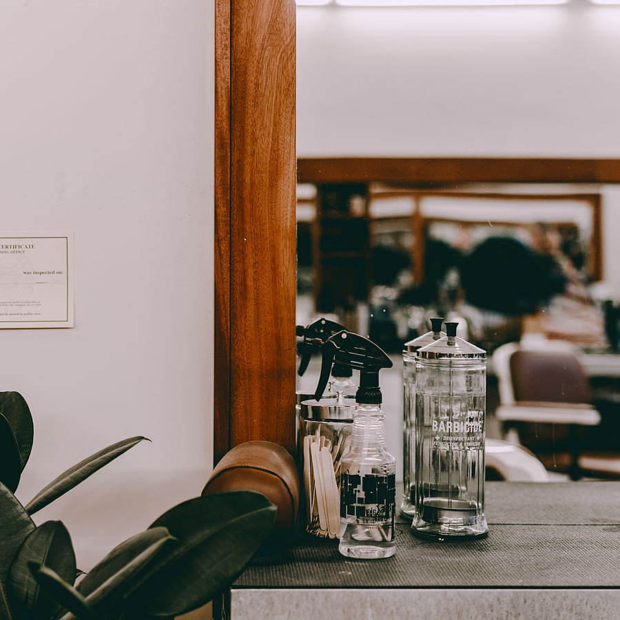 French press and coffee beans on a rustic table