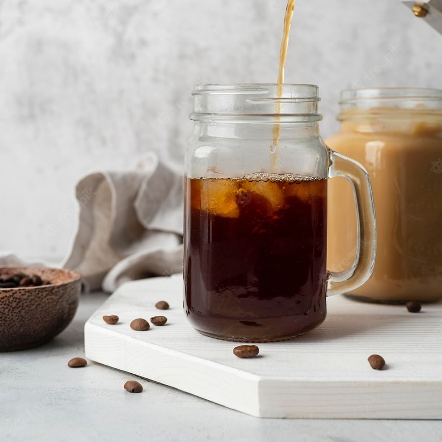 Close-up view of cold brew coffee with varying shades representing different brew ratios